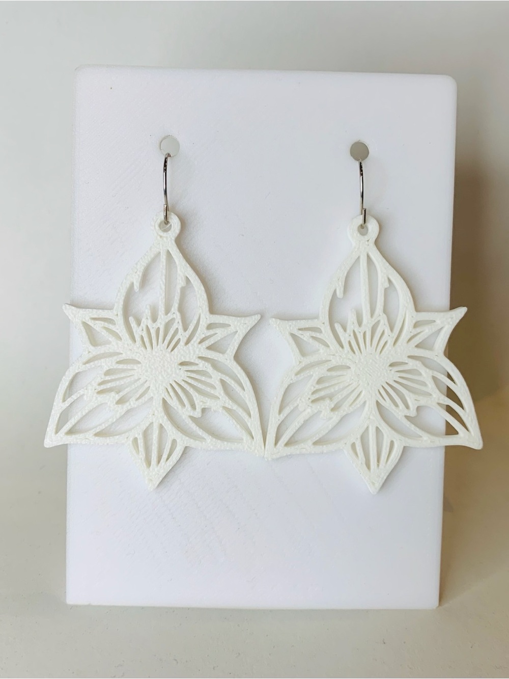 White Floral Cutout Drop Earrings